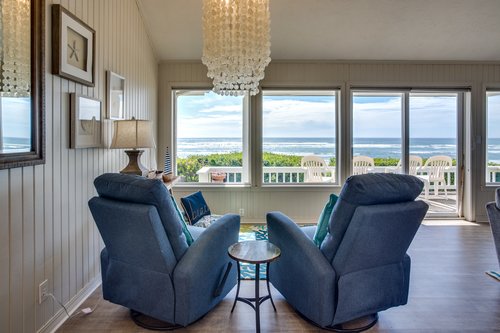 Separate conversation area with views of the ocean.