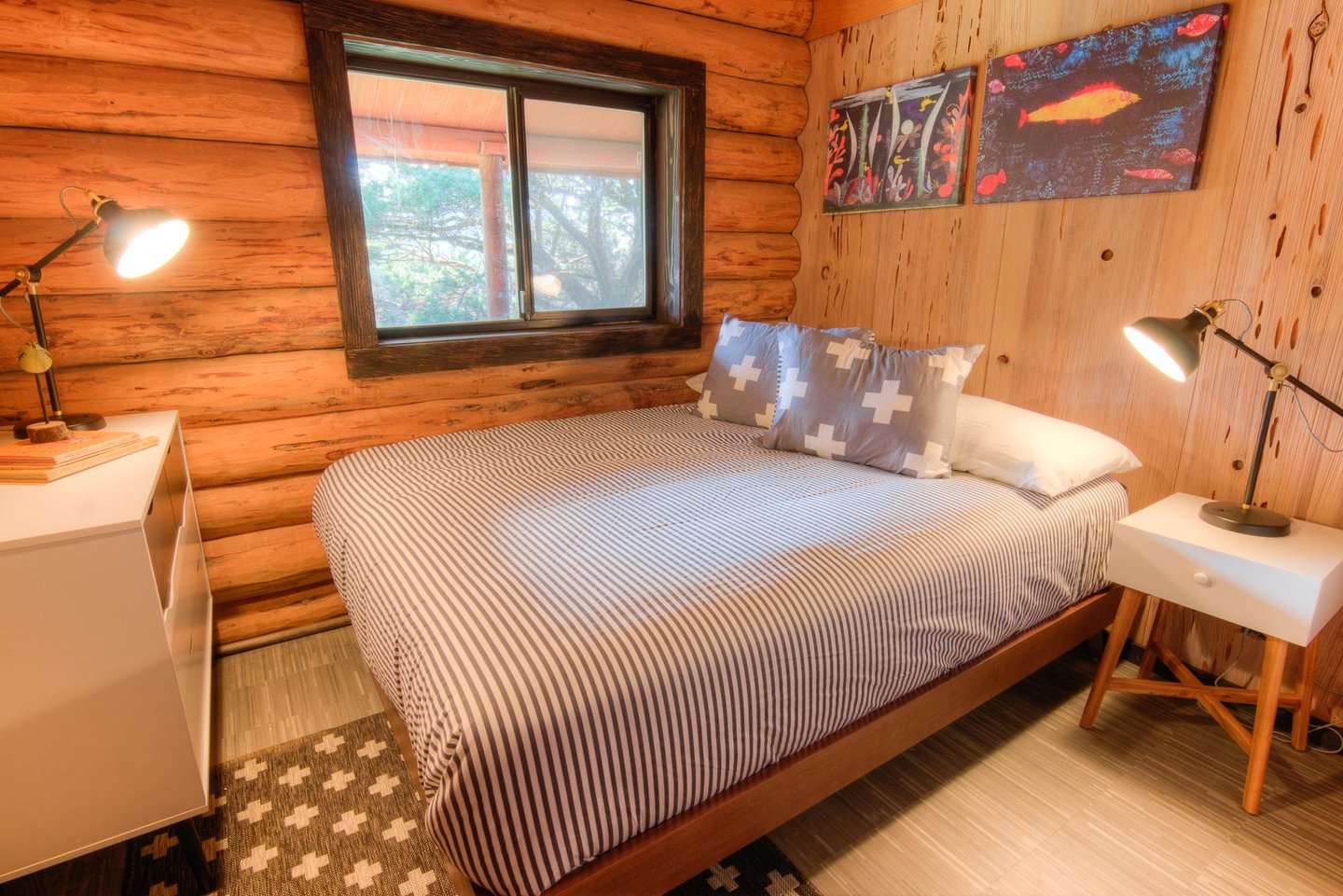 Cozy up in this bedroom with a queen bed.