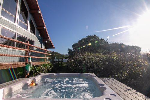 Easy access to the hot tub from the deck or the side yard.