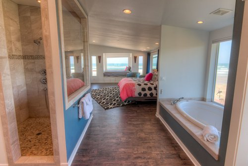 The primary bath has both a soaking tub and a walk in shower.