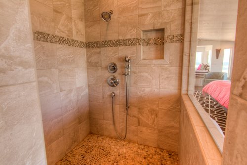 Beautiful and large tiled walk in shower.
