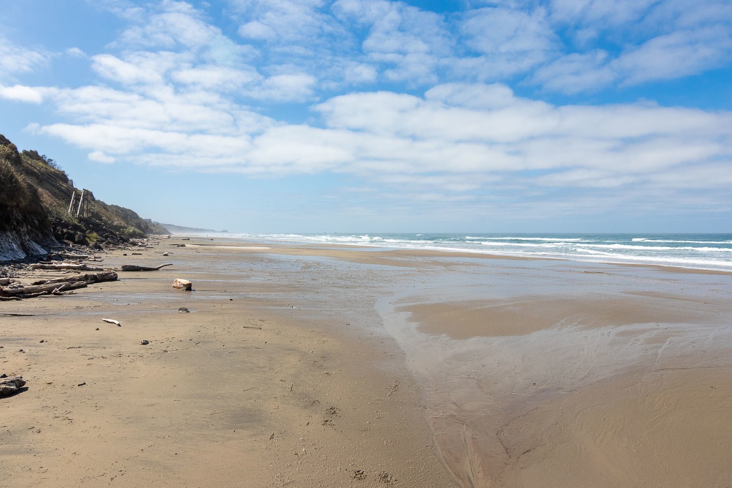 Sandy beach to the south.