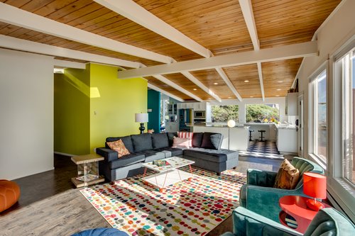 Open concept living lets the cooks in the kitchen join in the fun.