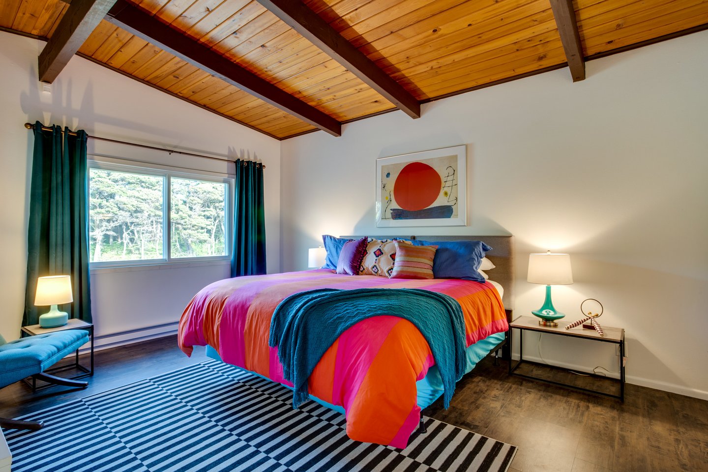 Large second floor bedroom with a king bed is very spacious.