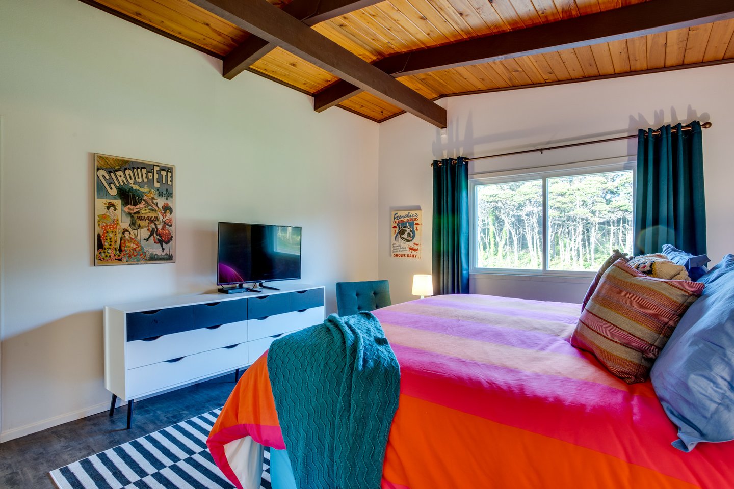 The large window lets in a lot of sunlight.