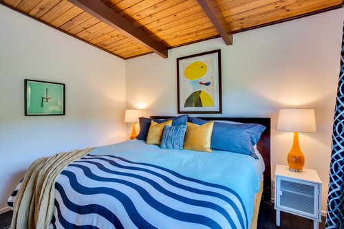 Listen to the ocean waves while sleeping in the king bed.