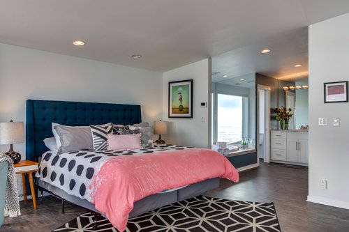 This spacious primary bedroom is a wonderful retreat.