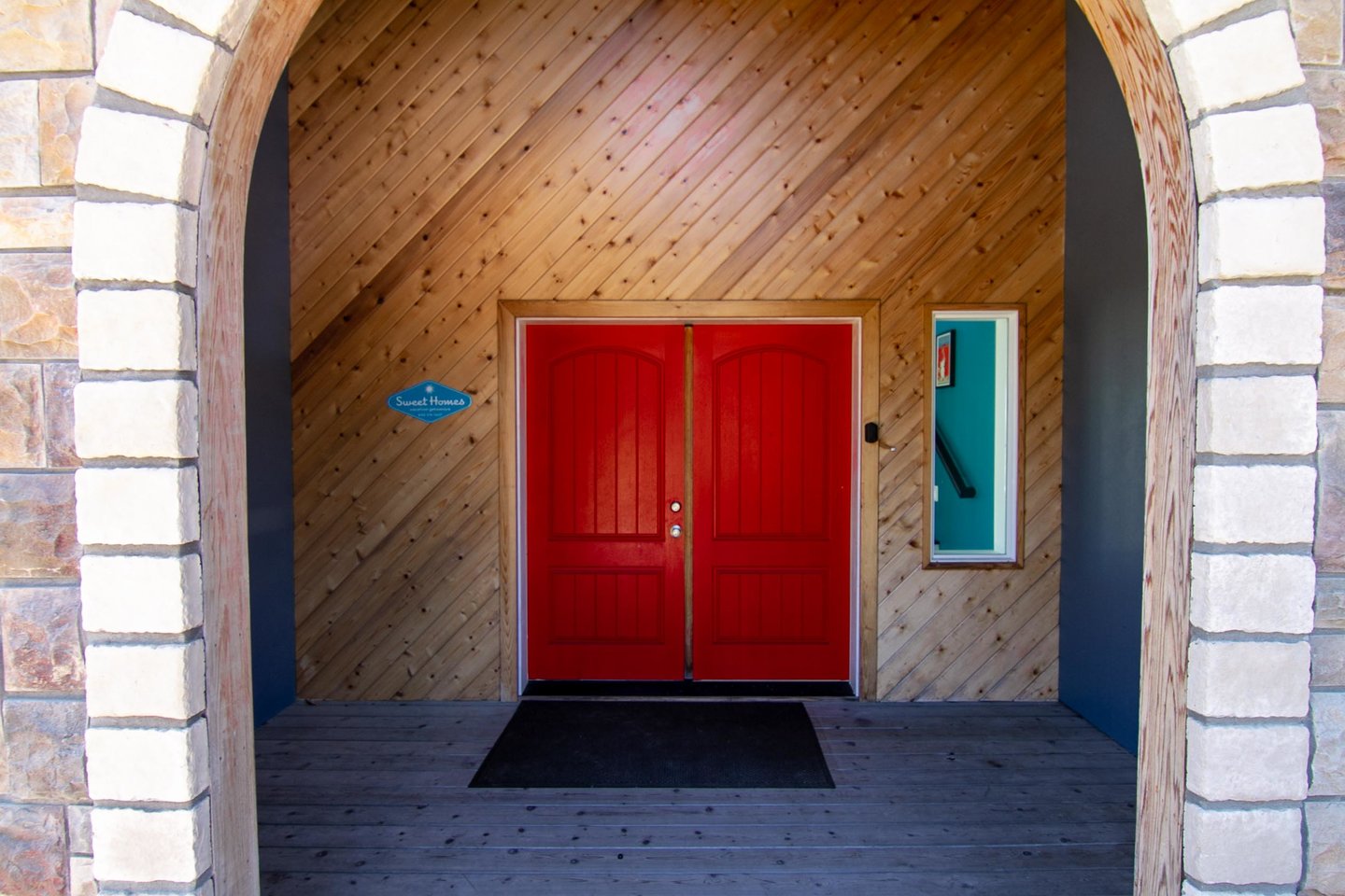 Get ready for a relaxing stay just past these big red doors.