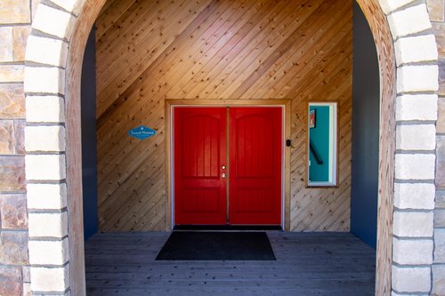 Get ready for a relaxing stay just past these big red doors.