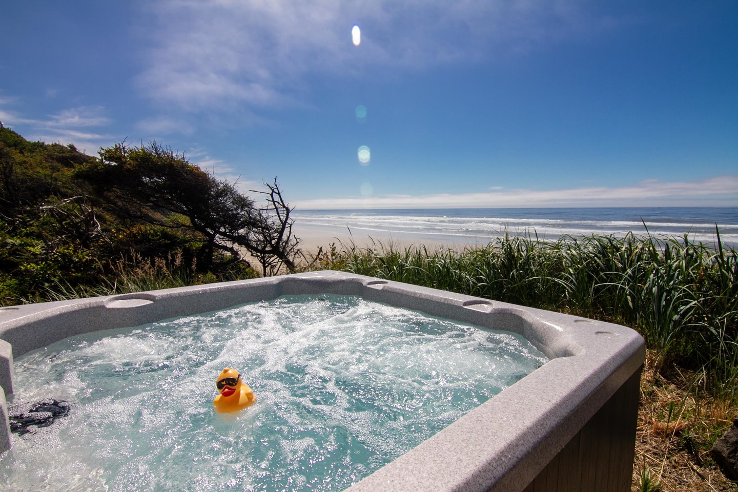 Enjoy a hot soak in the bubbles of this ocean front hot tub.