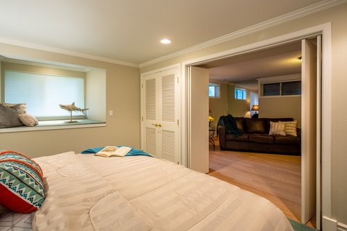 Fourth bedroom is located right off the downstairs den.