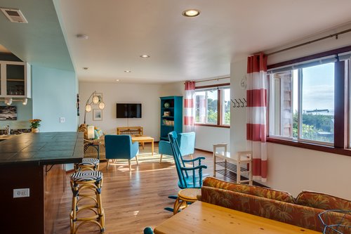The open concept living area makes Beach Bum-Galow a spacious retreat for 4.