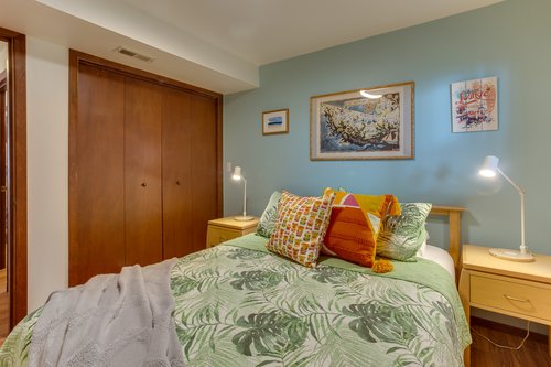 The queen bed is a comfy retreat.