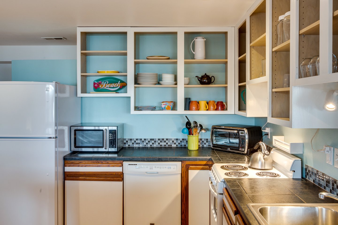 Fully stocked kitchen is perfect to put together a picnic lunch.