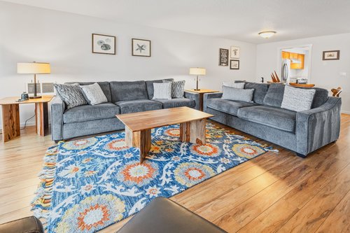 The living room has a sleeper sofa available that sleeps two more.