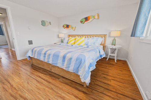 Sleep tight in the king bed after a day of exploring.