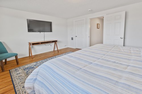 Watch some late night TV from the comfort of bed!