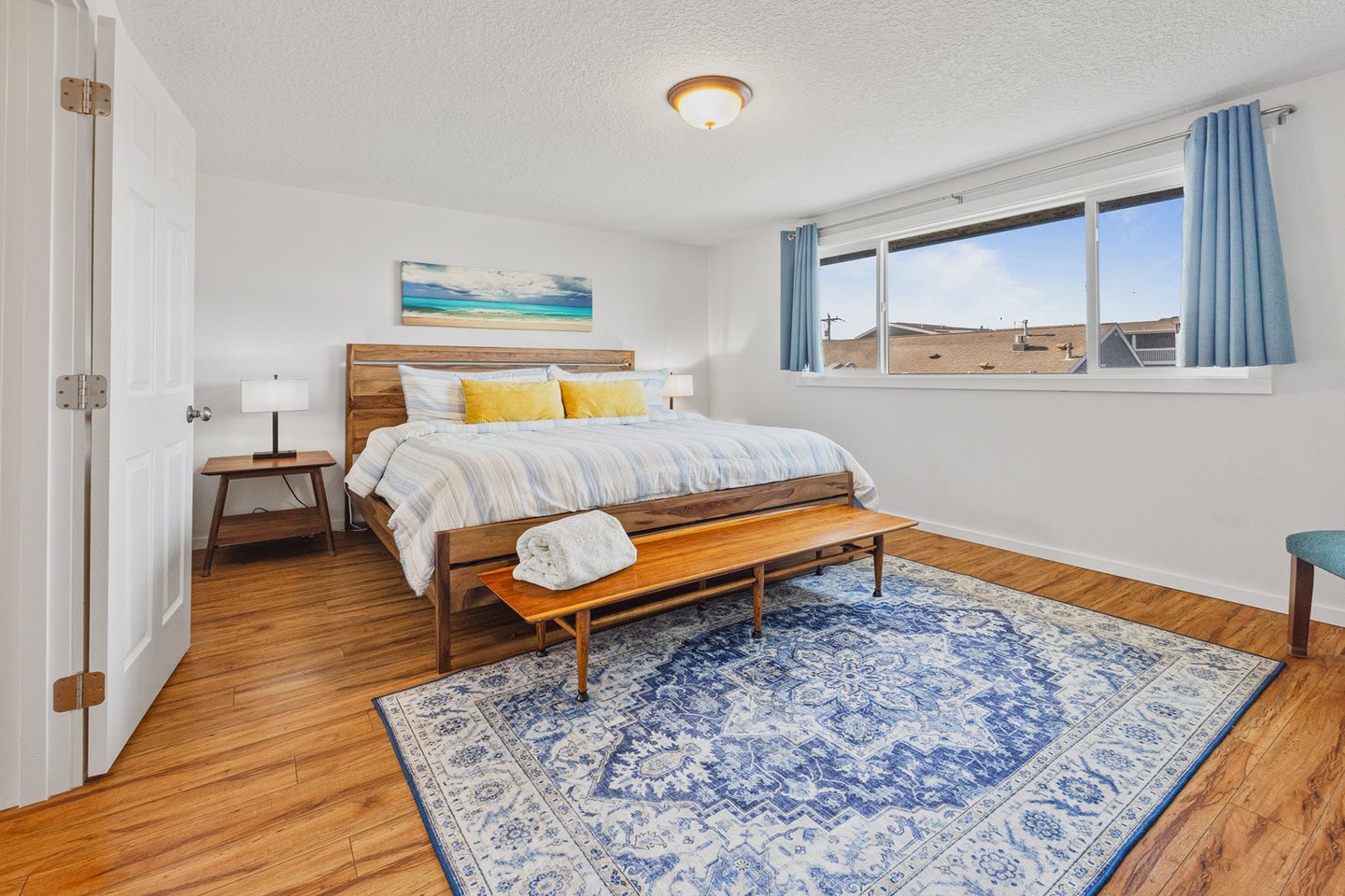 Spacious getaway in this bedroom with king bed.