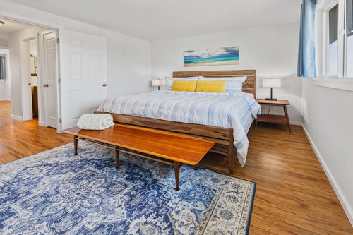 Relax in the cozy king bed after a day of exploring.