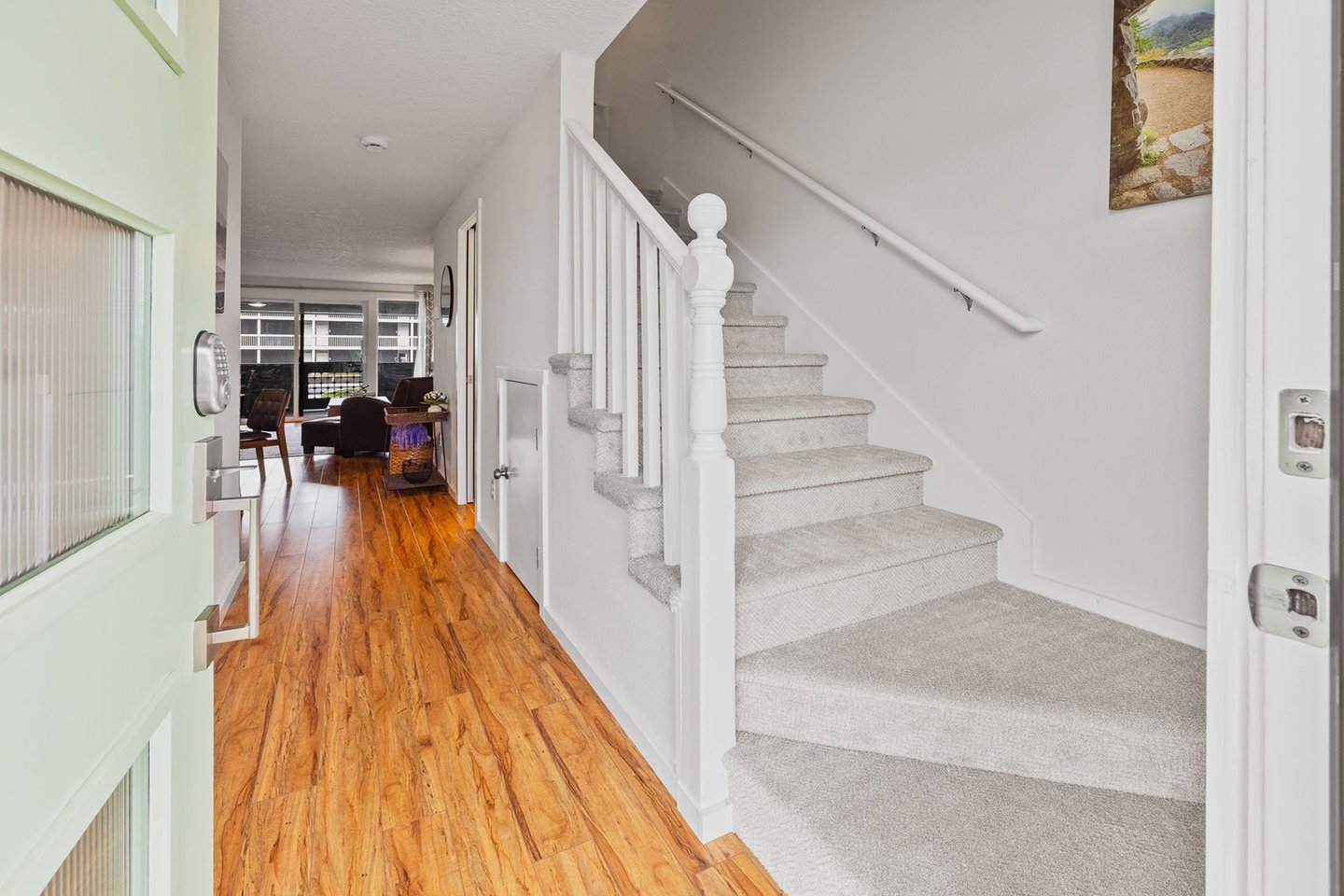 Up the stairs for two bedrooms and a bath.