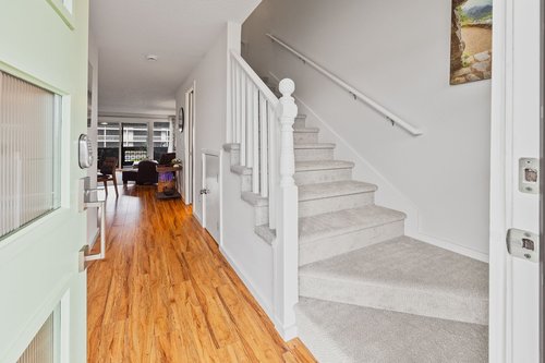 Up the stairs for two bedrooms and a bath.