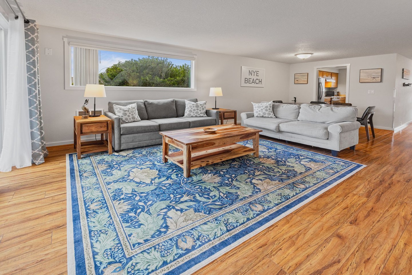 The living room has a sleeper sofa available that sleeps two more.