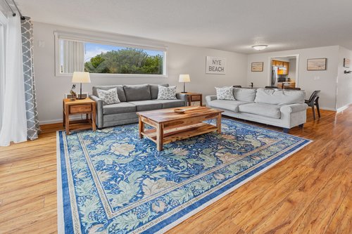 The living room has a sleeper sofa available that sleeps two more.