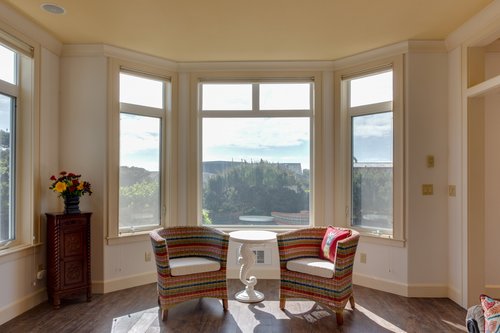 Enjoy the sunshine and a favorite drink while sitting at the living room bay window.