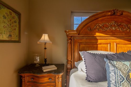 End your day with a book in a cozy bed.