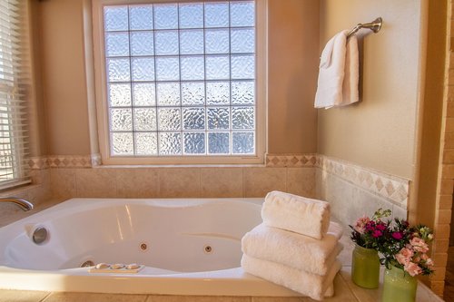 Soak in the tub after a long day (no longer a jacuzzi tub).