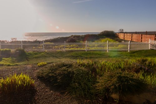 The fenced-in yard is perfect for kids and dogs.