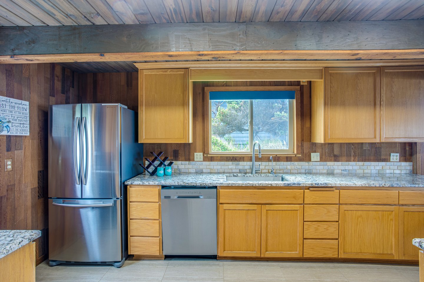 Enter into the warm kitchen with lots of natural light.