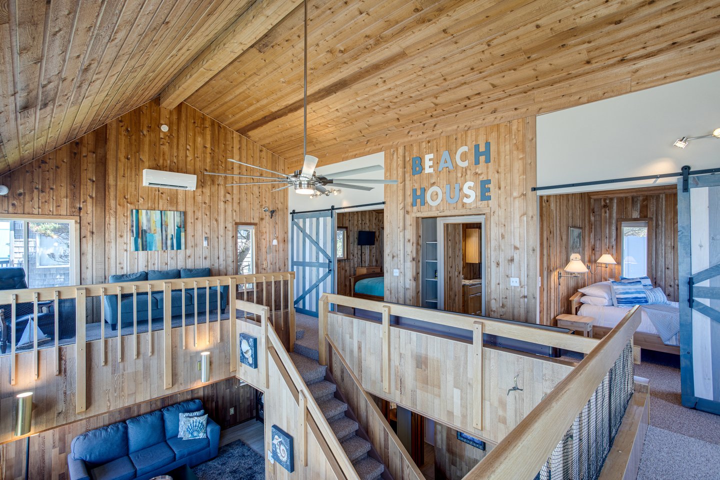 The upstairs open loft has two sitting areas and two bedrooms!
