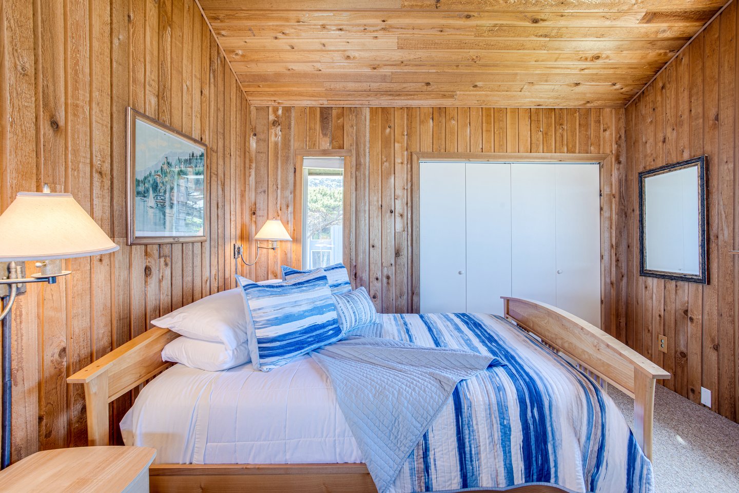 One of the cozy upstairs bedrooms with a queen bed.