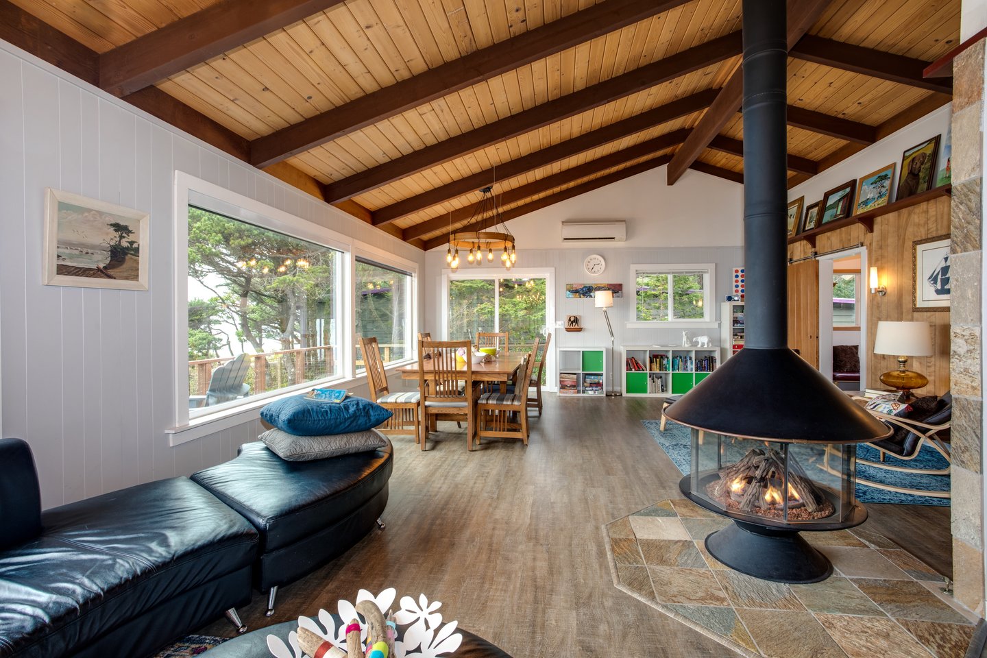 Read by the fire while natural light pours into the living space.