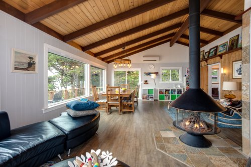 Read by the fire while natural light pours into the living space.