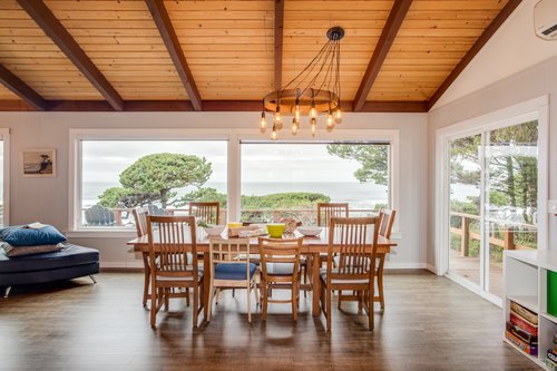 Dine with a view of the ocean under a custom made chandelier.