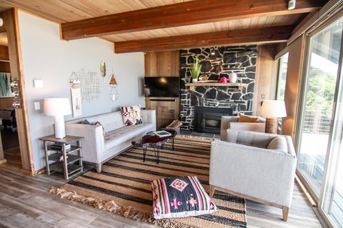Relax in the cozy, Boho inspired living room.