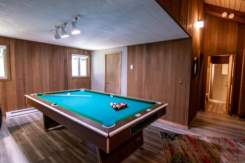 Head upstairs for a friendly game of pool!