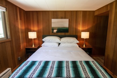 Second upstairs bedroom with queen bed.