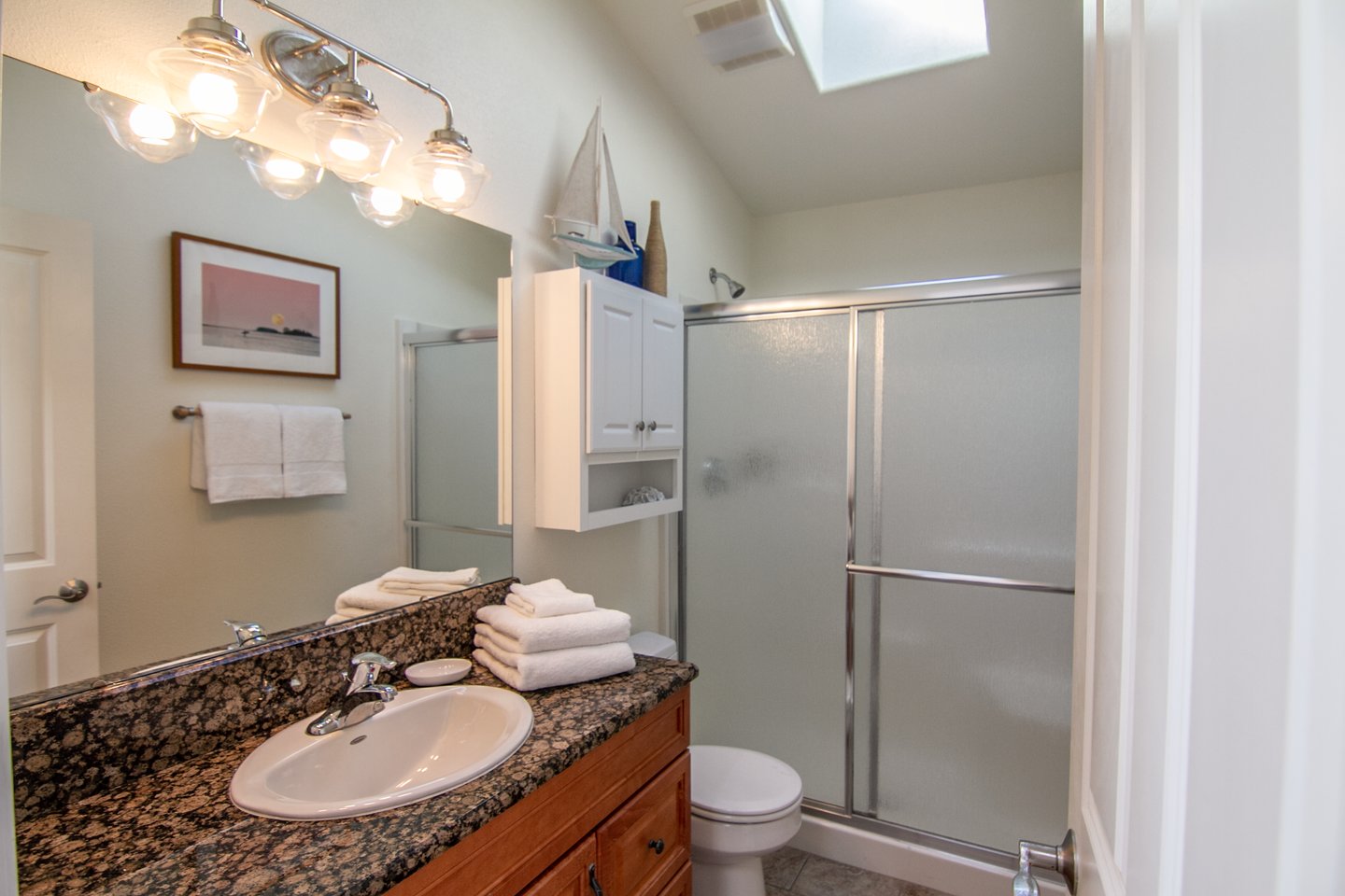 The bathroom upstairs right off the bedroom.