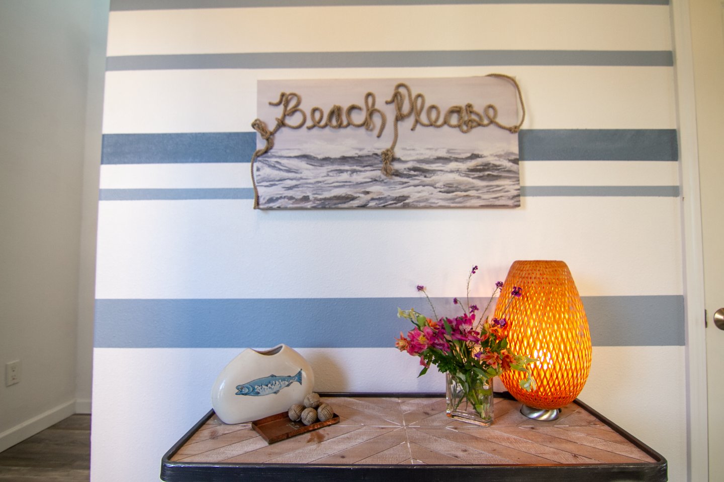 How many times can you find 'Beach, Please' in this adorable house?