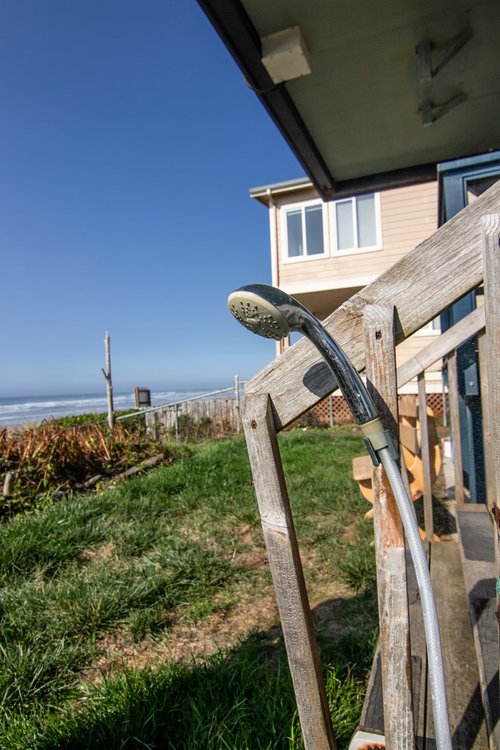 Rinse off your sandy feet in the outdoor shower after exploring the shoreline.