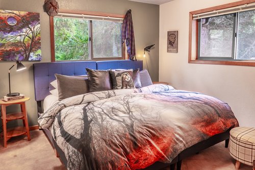 Any Edgar Allen Poe fan will love to spend the night in this mysterious room with king bed.