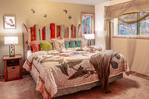 Relax and pretend you're laying in the grass in this relaxing room with king bed.