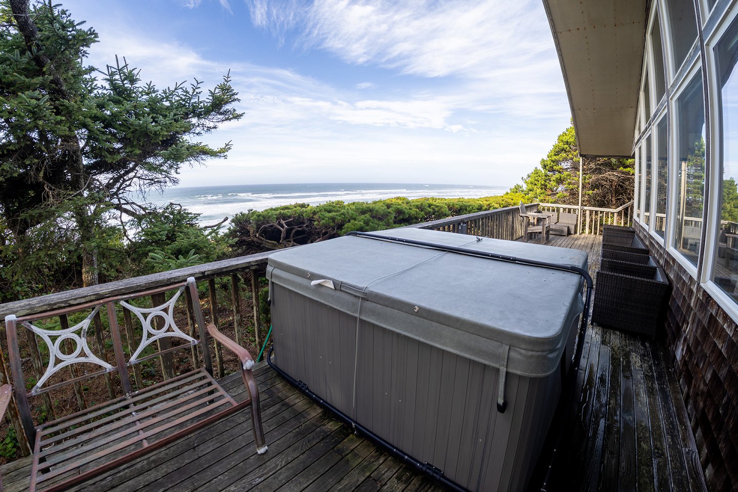 Enjoy a nice soak in the hot tub while watching the waves.