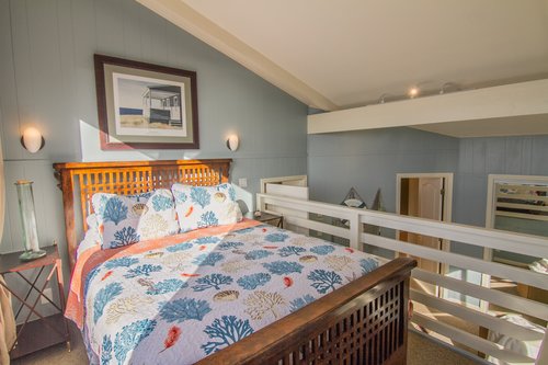 The queen loft bed upstairs is such a fun feature!