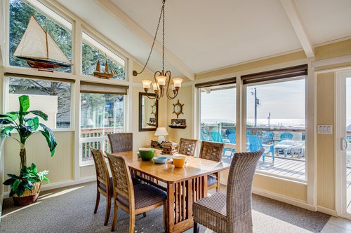 The large dining table is perfect for dining or playing board games!