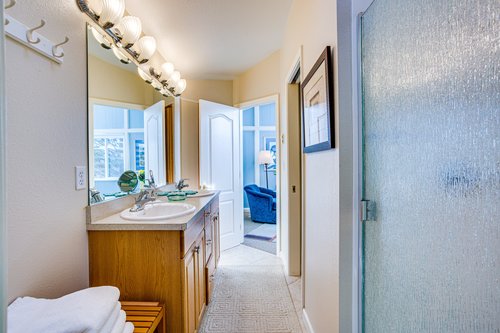The jack and jill bathroom upstairs with a double vanity gives everyone plenty of privacy.