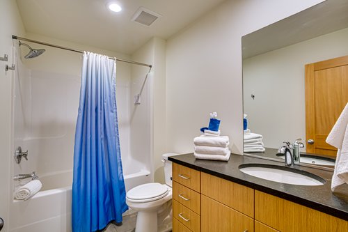 A full bathroom downstairs for two bedrooms to share.